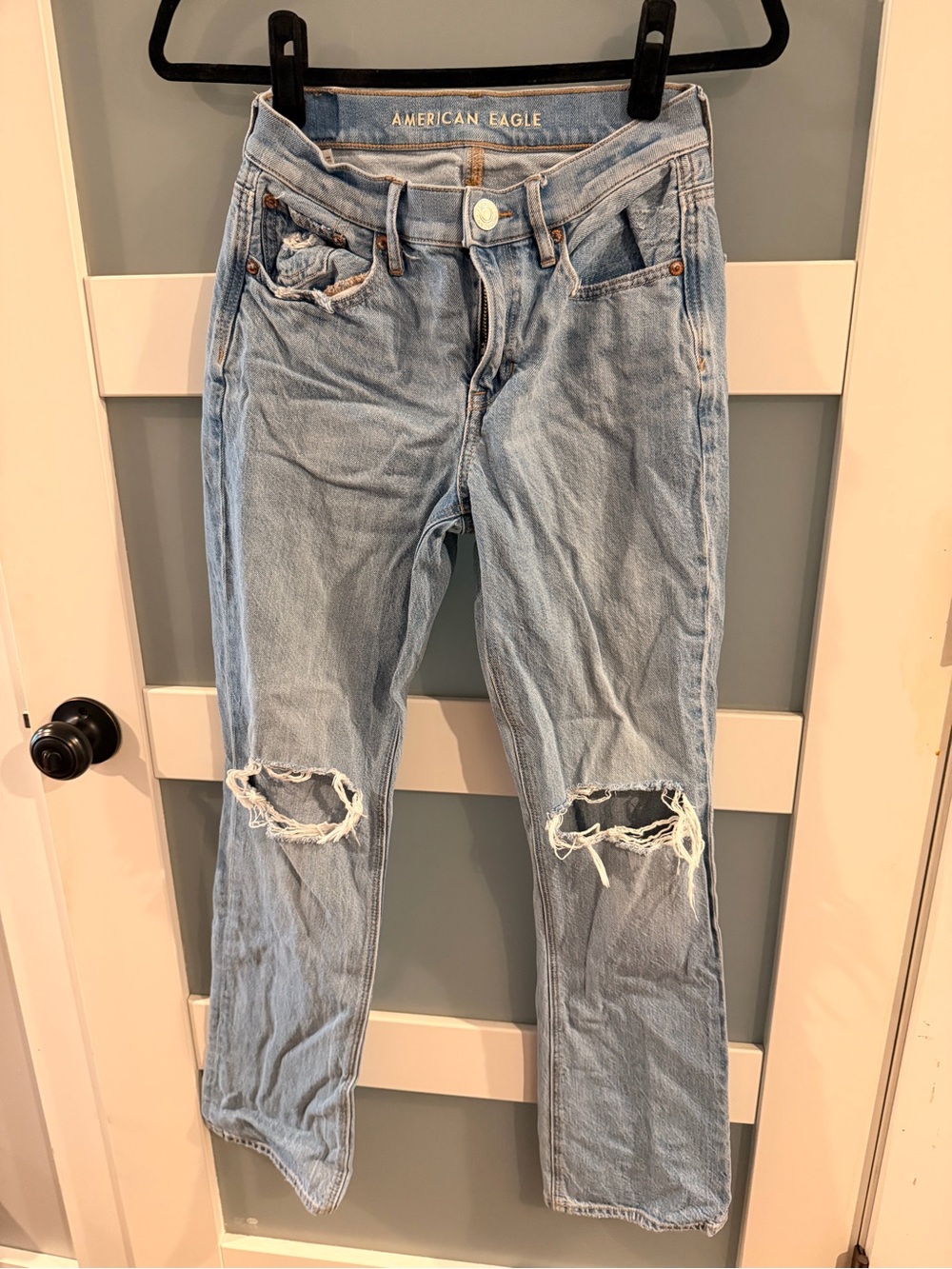 American Eagle Outfitters light blue ripped straight leg jeans